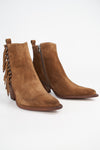 AUSTIN sunset-tan suede fringe texan boots.