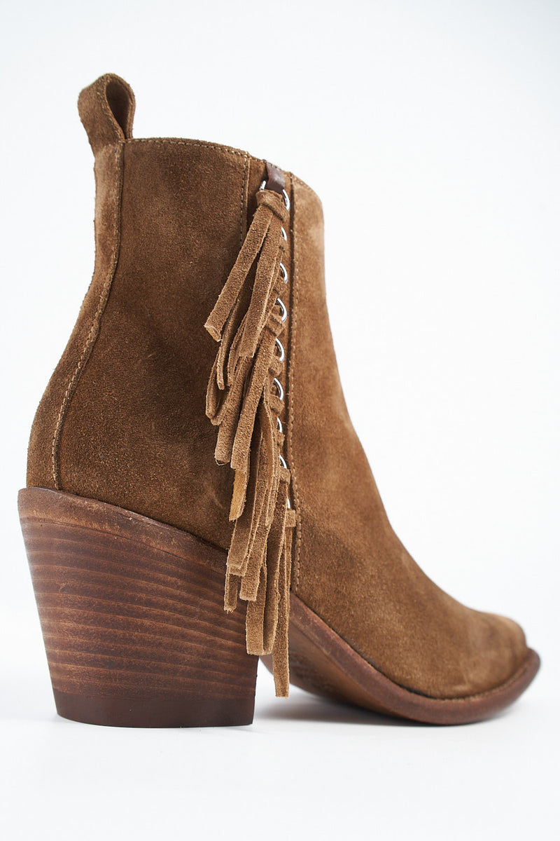 AUSTIN sunset-tan suede fringe texan boots.