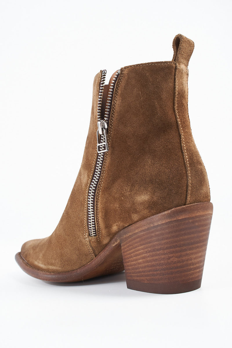 AUSTIN sunset-tan suede fringe texan boots.