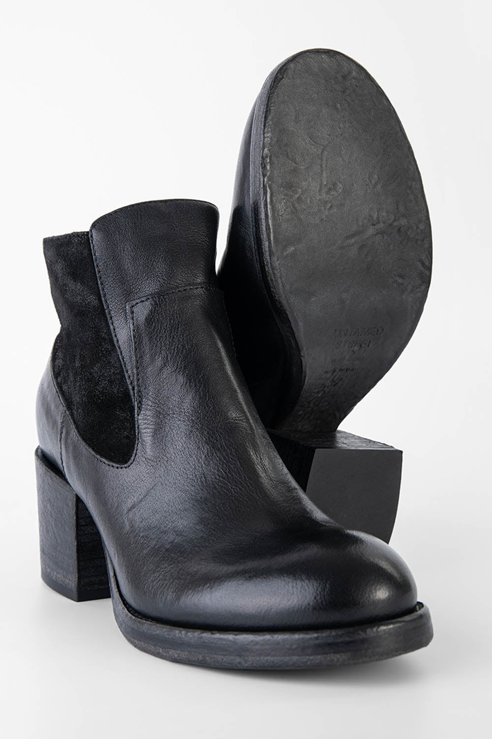 BERKELEY charcoal-black mid heel low boots.