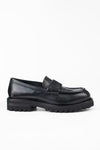 CAMDEN jet-black slip on shoes.