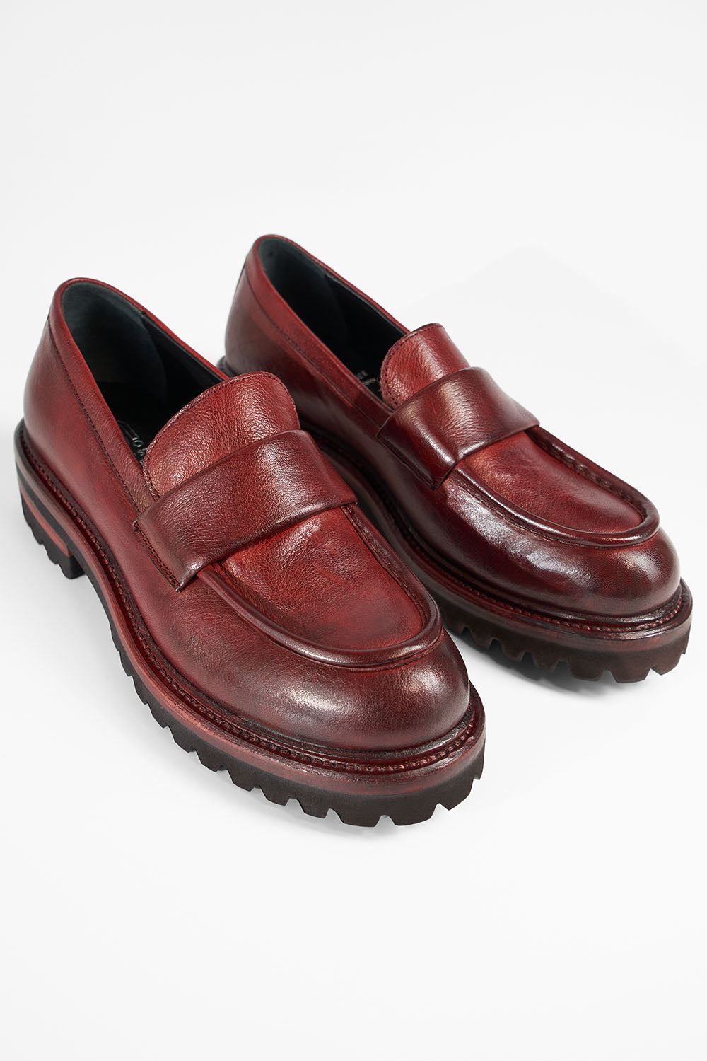 CAMDEN red-berry slip on shoes.