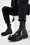 CAMDEN tar-black double-zip military boots.