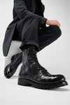 CAMDEN tar-black double-zip military boots.