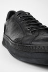 COLE rugged-black welted distressed sneakers.