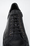 COLE rugged-black welted distressed sneakers.