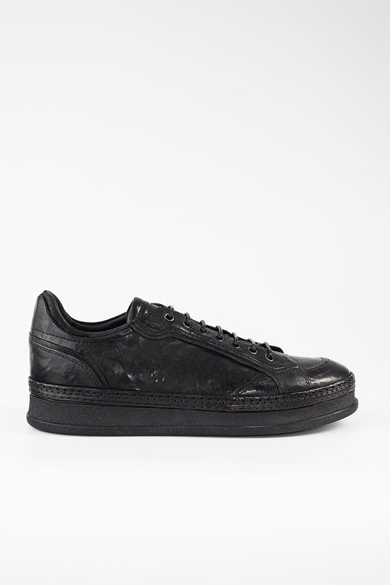 COLE rugged-black welted distressed sneakers.