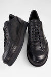 COLE rugged-black welted distressed sneakers.