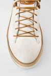 COLE white welted distressed loop sneakers.