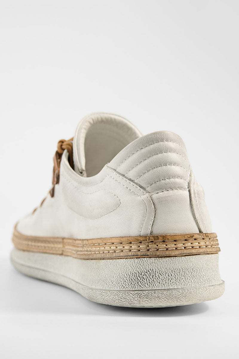 COLE white welted distressed loop sneakers.