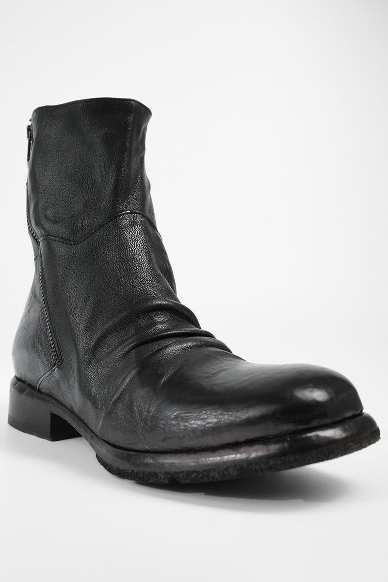 IVES urban-black laceless boots.