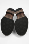 LAMBETH jet-black welted monk shoes.