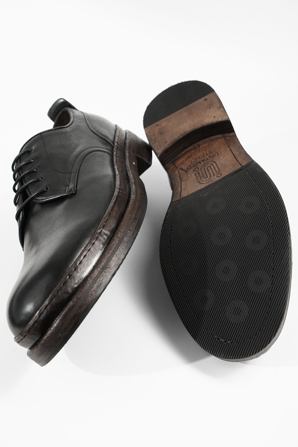 LAMBETH jet-black welted derby shoes.