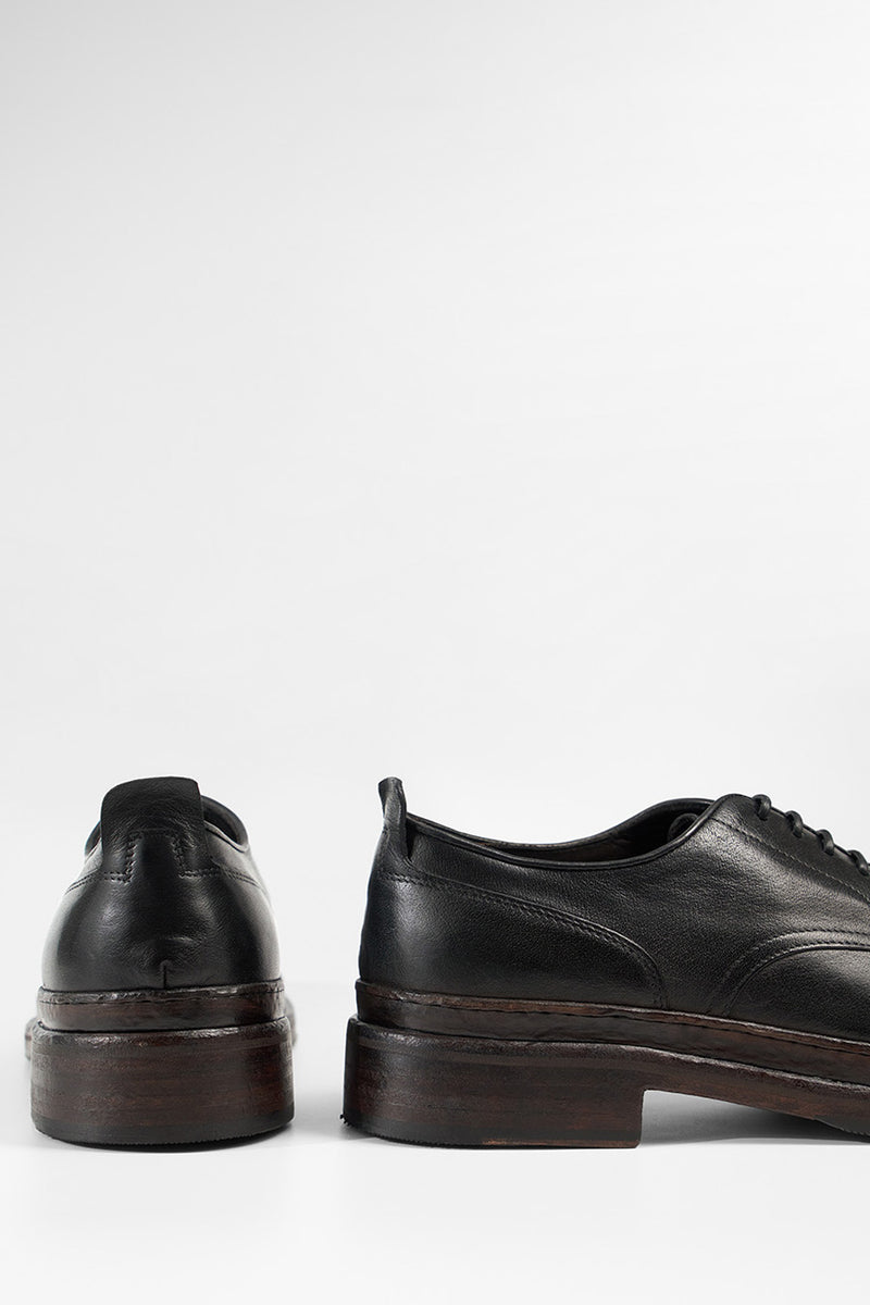 LAMBETH jet-black welted derby shoes.