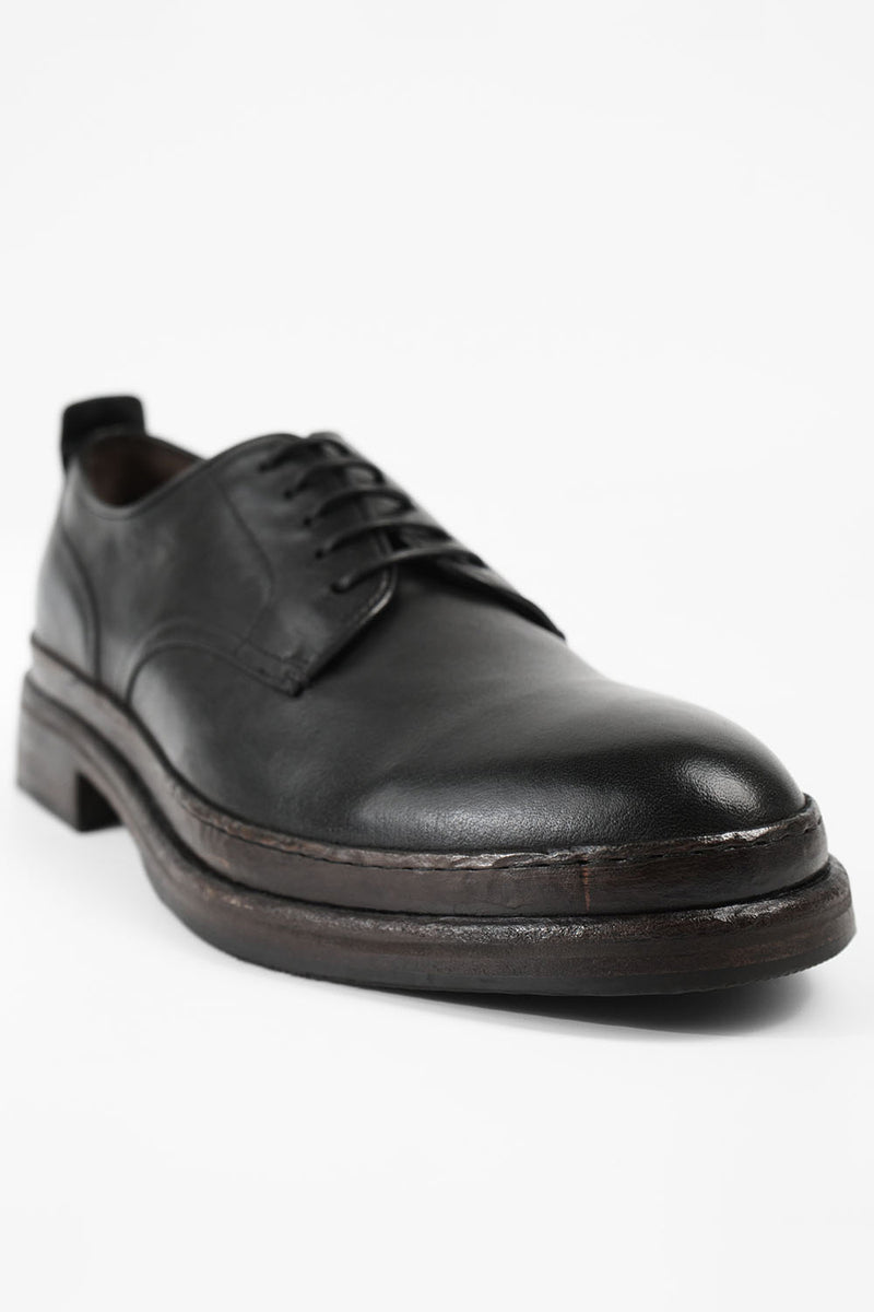 LAMBETH jet-black welted derby shoes.