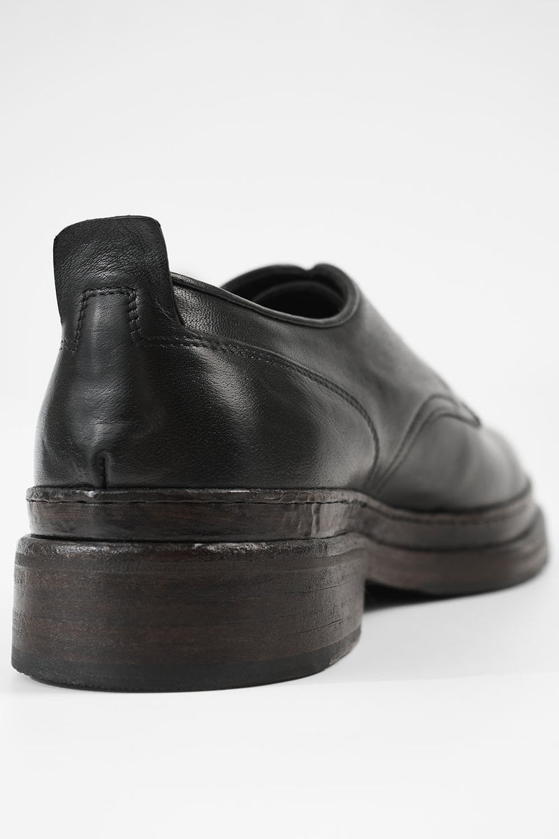 LAMBETH jet-black welted derby shoes.