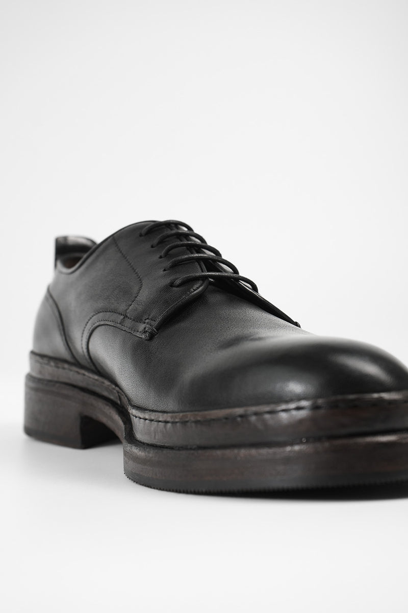 LAMBETH jet-black welted derby shoes.