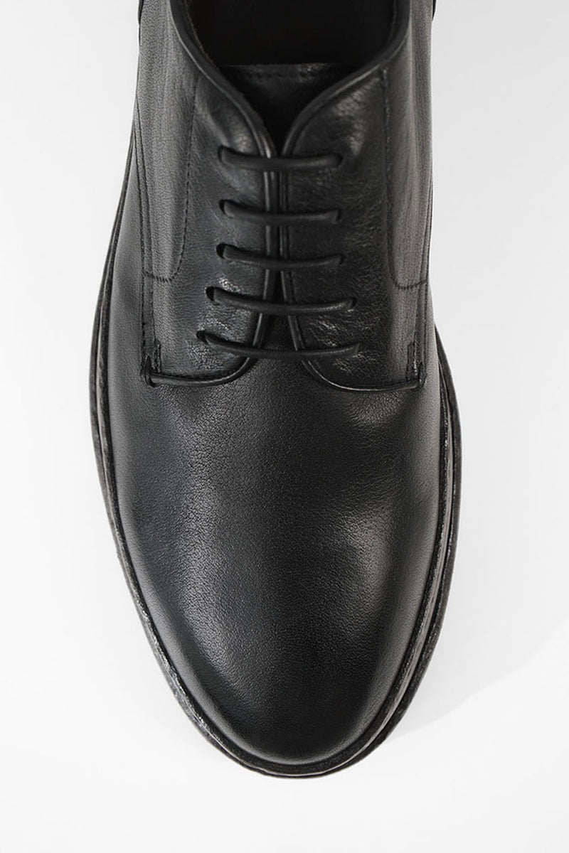 LAMBETH jet-black welted derby shoes.