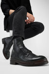 LAMBETH jet-black welted lace up boots.