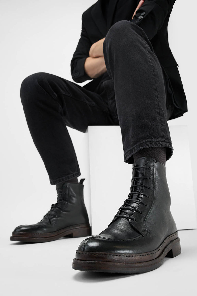 LAMBETH jet-black welted lace up boots.