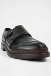 LAMBETH jet-black welted monk shoes.