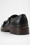 LAMBETH jet-black welted monk shoes.