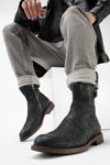 EYTON matte-black laceless ankle boots.