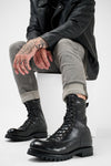 CAMDEN jet-black military boots.