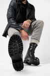 CAMDEN jet-black military boots.