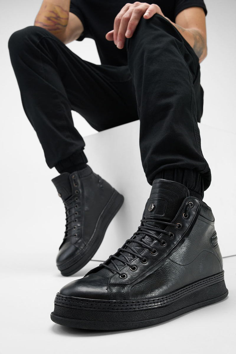 COLE rugged-black welted distressed high sneakers.