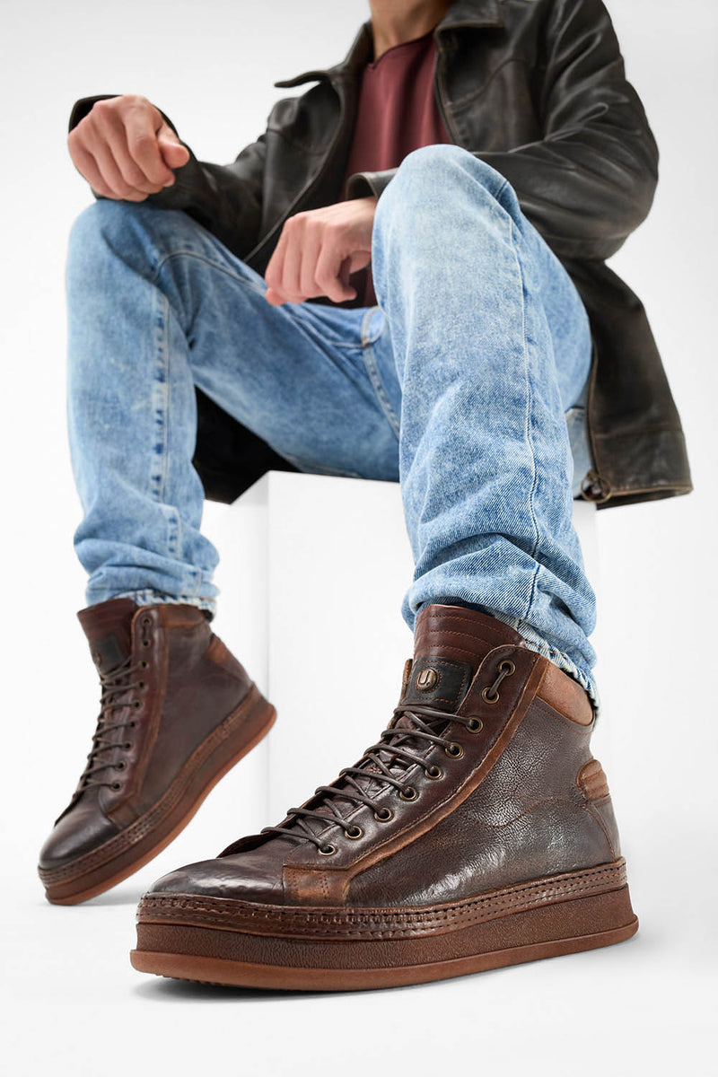 COLE cognac welted distressed high sneakers.