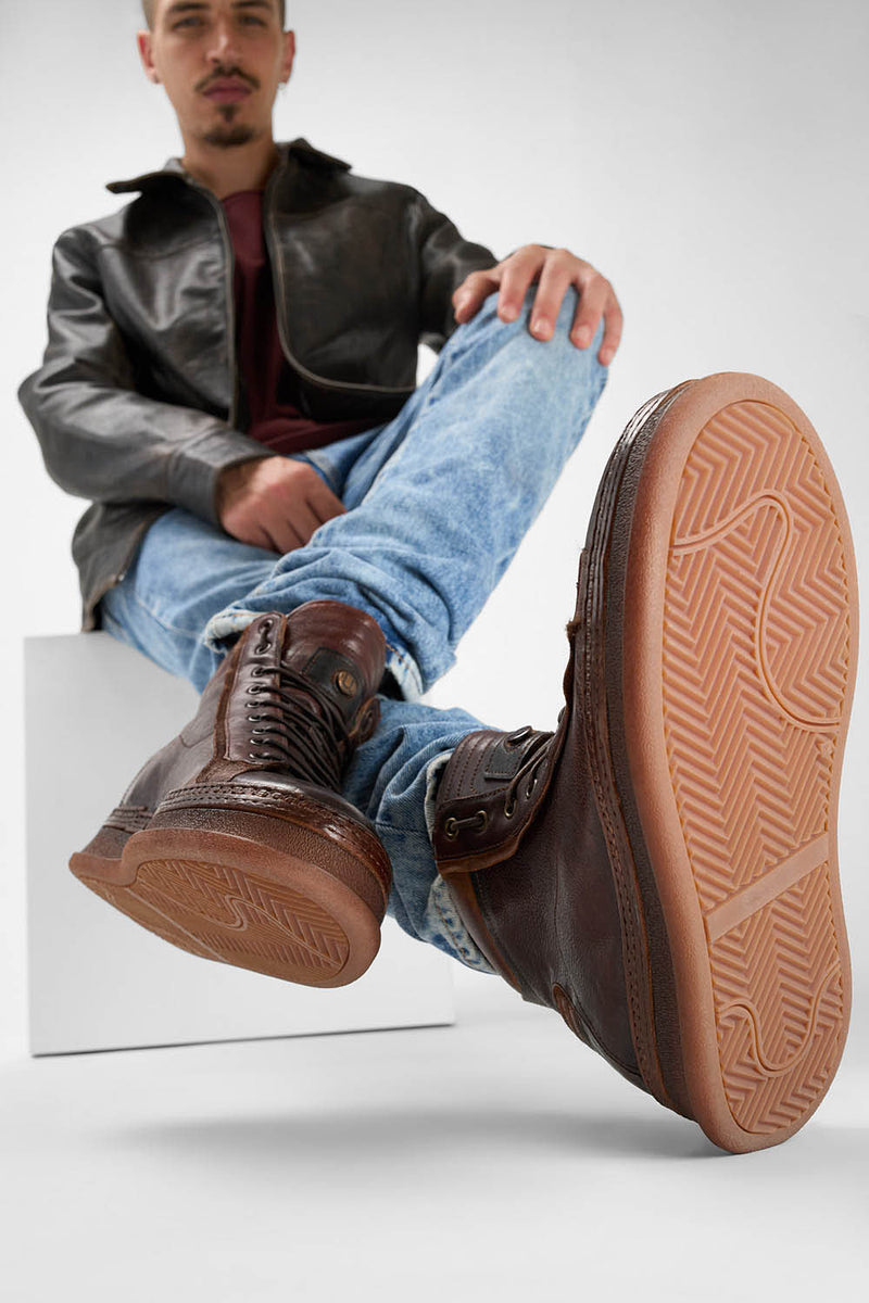 COLE cognac welted distressed high sneakers.