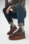 COLE cognac welted distressed sneakers.