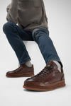 COLE cognac welted distressed sneakers.