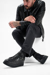 COLE rugged-black welted distressed loop sneakers.