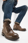 CURZON husk-brown military boots.