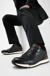 OWEN tuxedo-black triple stitched wingtip patina runners.