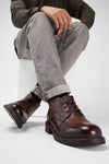 ROWLEY raw-chestnut folded chukka boots.