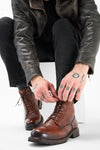 ROWLEY cognac folded lace up boots.