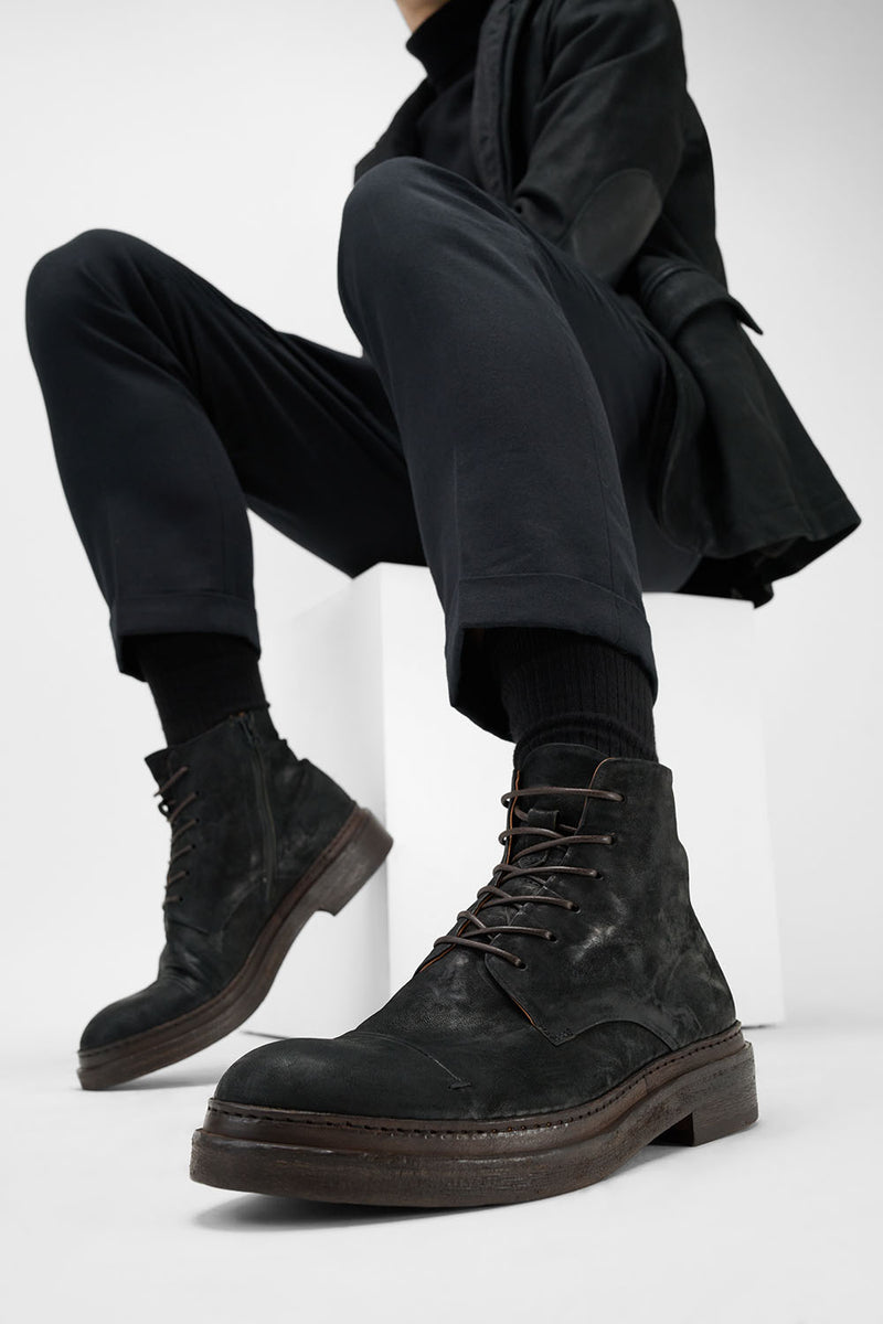 YALE distressed-black welted derby lace up boots.