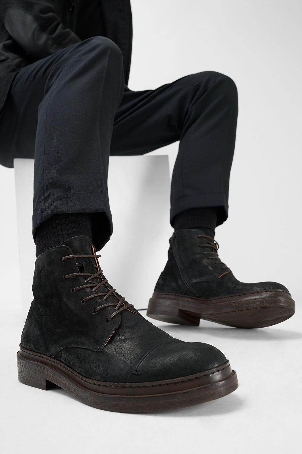 YALE distressed-black welted derby lace up boots.