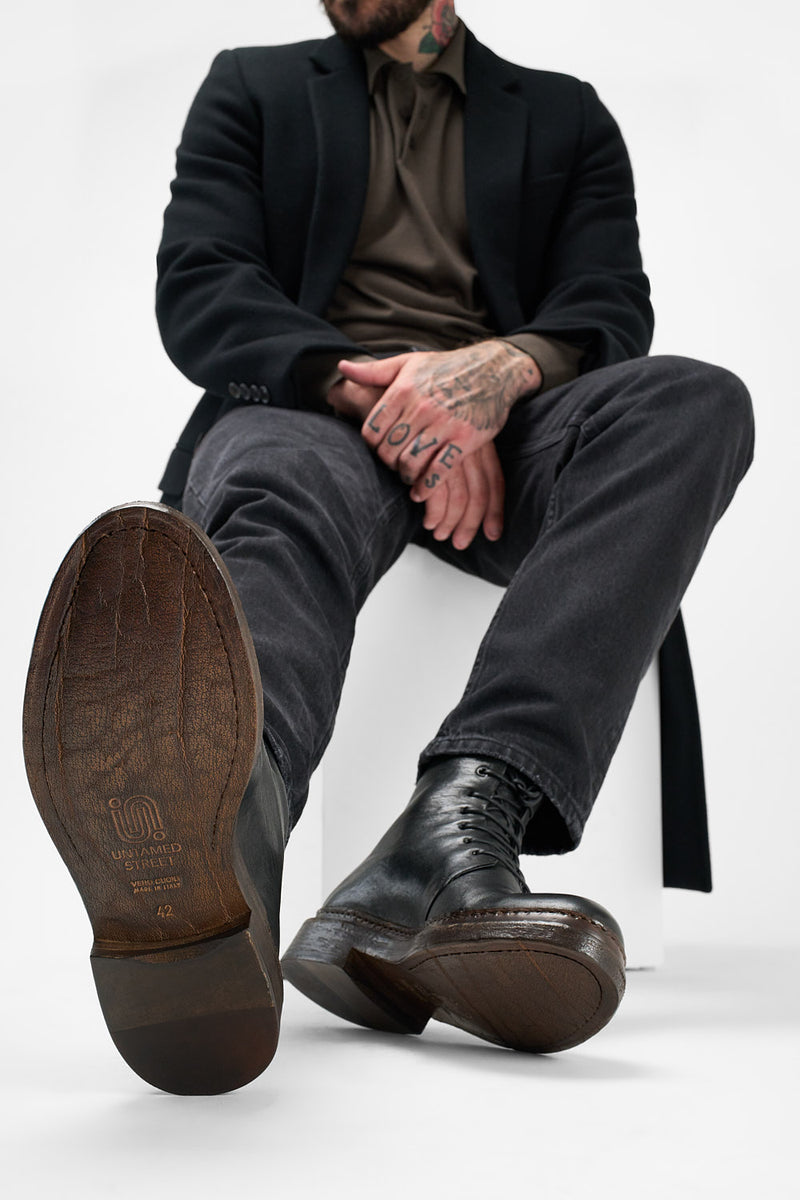 YALE tuxedo-black welted derby lace up boots.