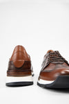 OWEN cocoa-brown triple stitched wingtip patina runners.