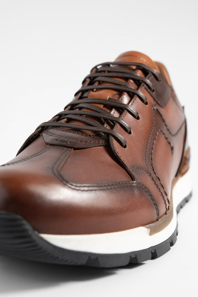 OWEN cocoa-brown triple stitched wingtip patina runners.