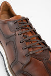 OWEN cocoa-brown triple stitched wingtip patina runners.