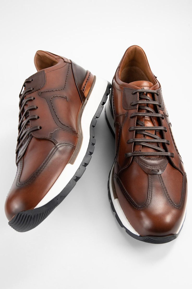 OWEN cocoa-brown triple stitched wingtip patina runners.