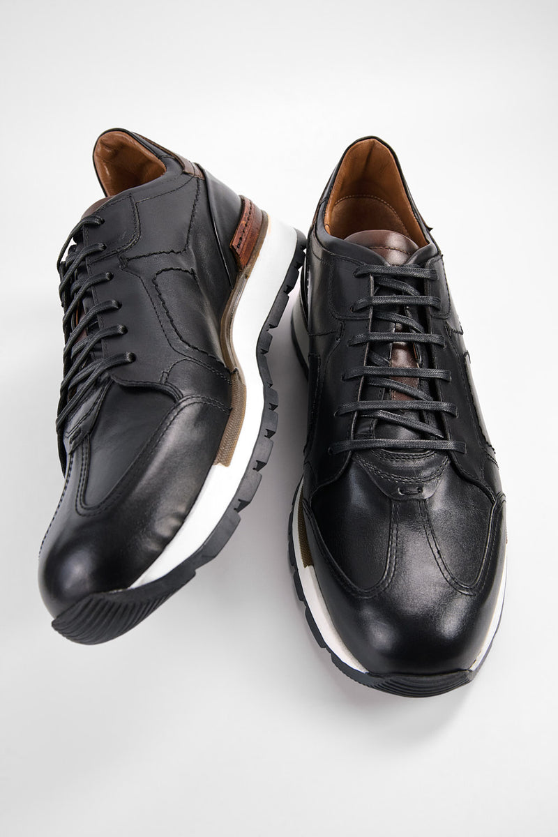 OWEN tuxedo-black triple stitched wingtip patina runners.