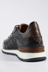 OWEN tuxedo-black triple stitched wingtip patina runners.