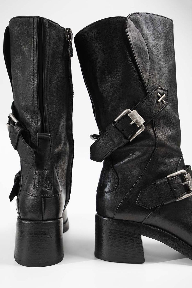 QUINN urban-black embellished high boots.