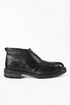 ROWLEY coal-black folded chukka boots.